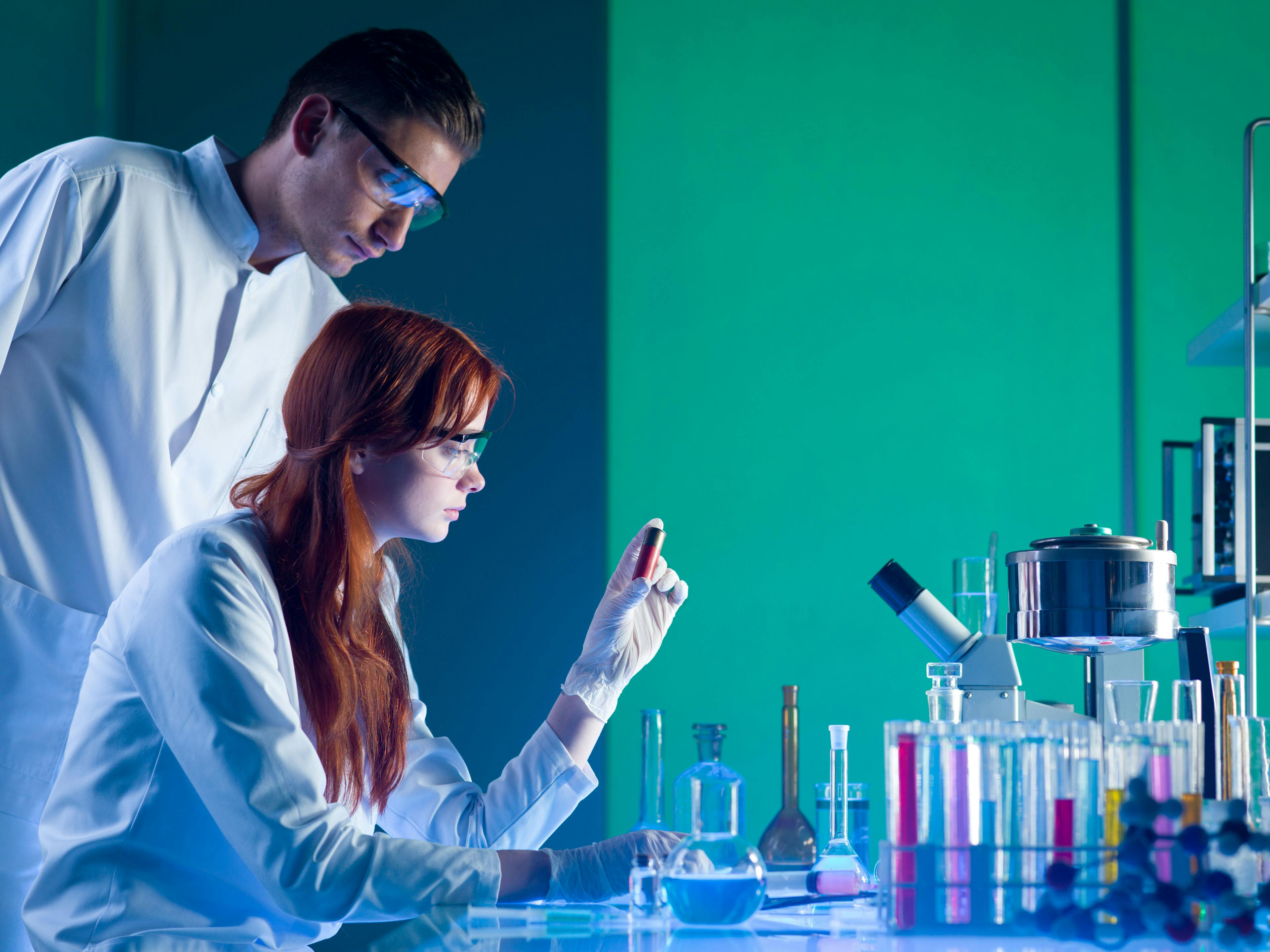 Forensic scientists studying a cartridge | Image Credit: © Daco - stock.adobe.com