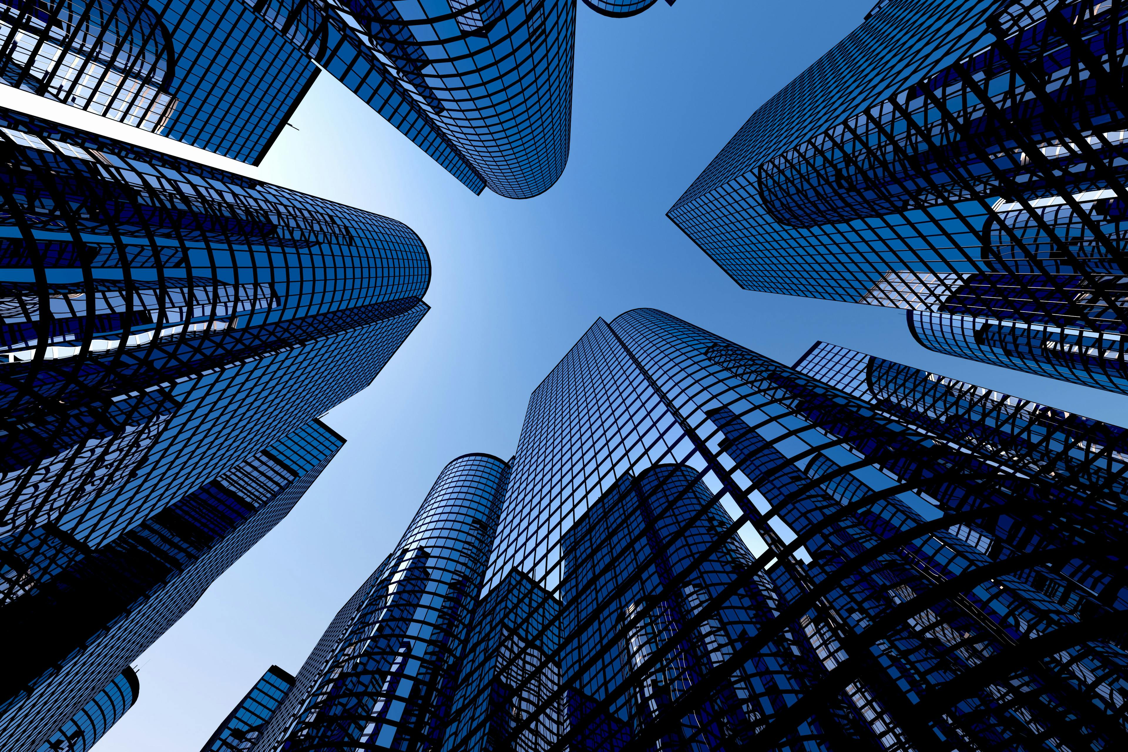 Reflective skyscrapers, business office buildings. | Image Credit: © Dabarti - stock.adobe.com.