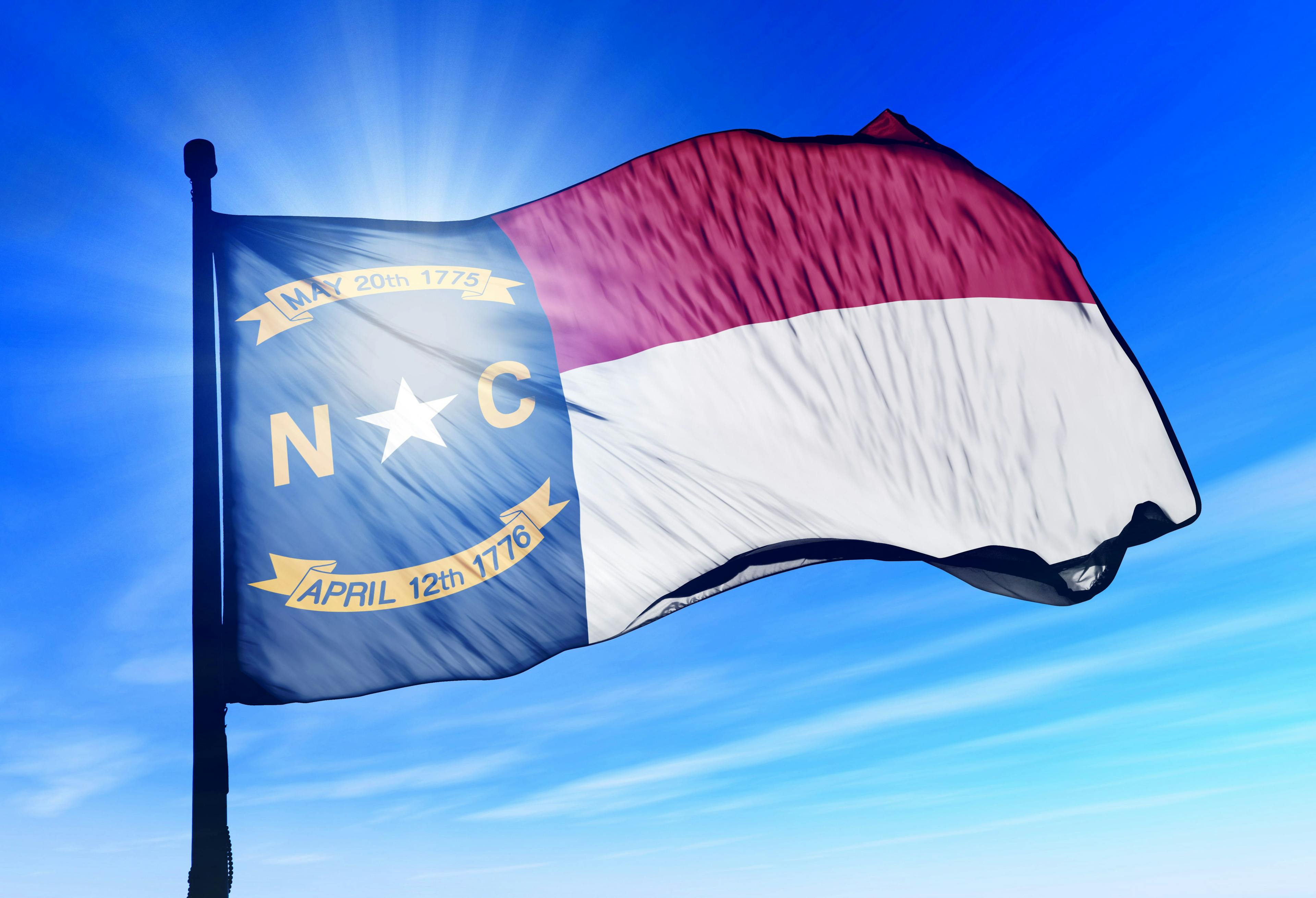 North Carolina (USA) flag waving on the wind | Image Credit: © Lulla - stock.adobe.com