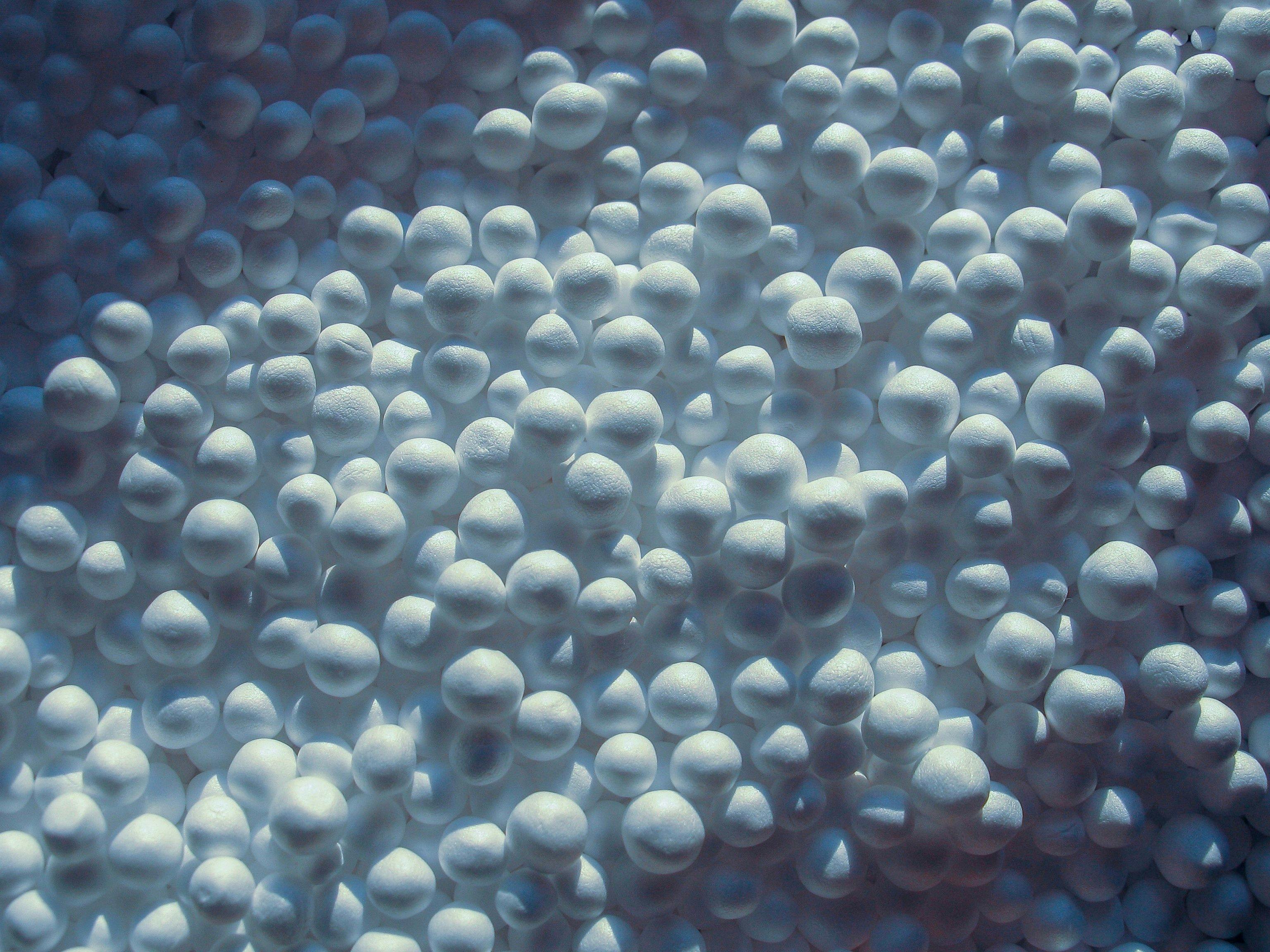 zoomed white expanded polystyrene pellets for production plastic bags | Image Credit: © Maryna - stock.adobe.com