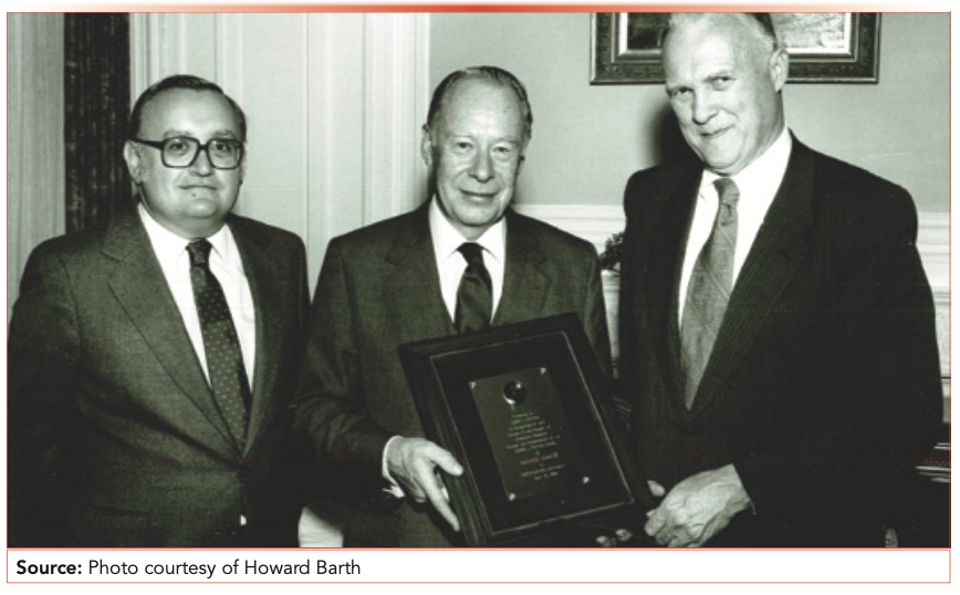 Karger in 1985 receiving the James L. Waters Chair of Analytical Chemistry by the late NU president Kenneth Ryder (center) and the late James L. Waters, founder of Waters Associates.