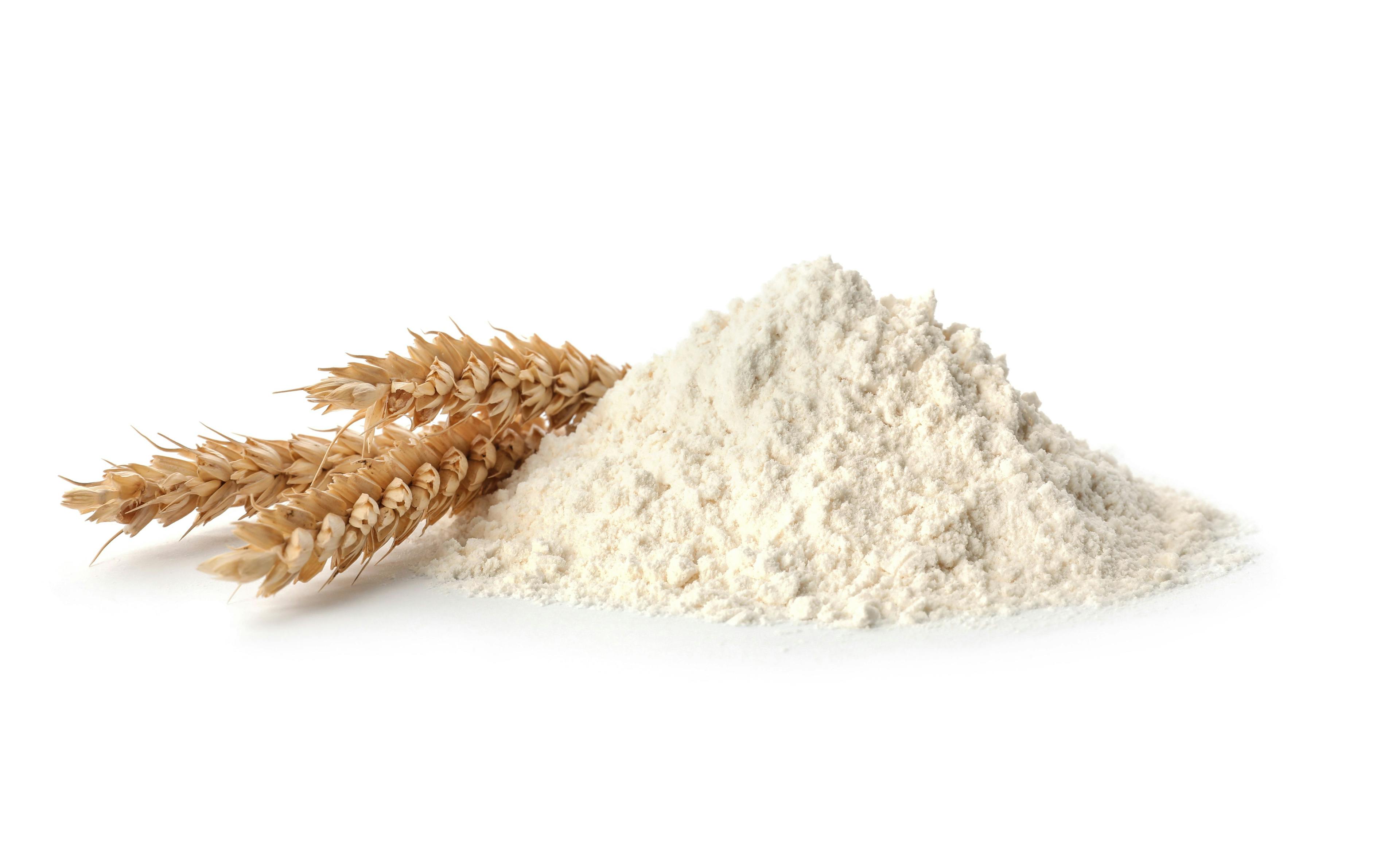Fresh flour and ears of wheat isolated on white | Image Credit: © New Africa - stock.adobe.com
