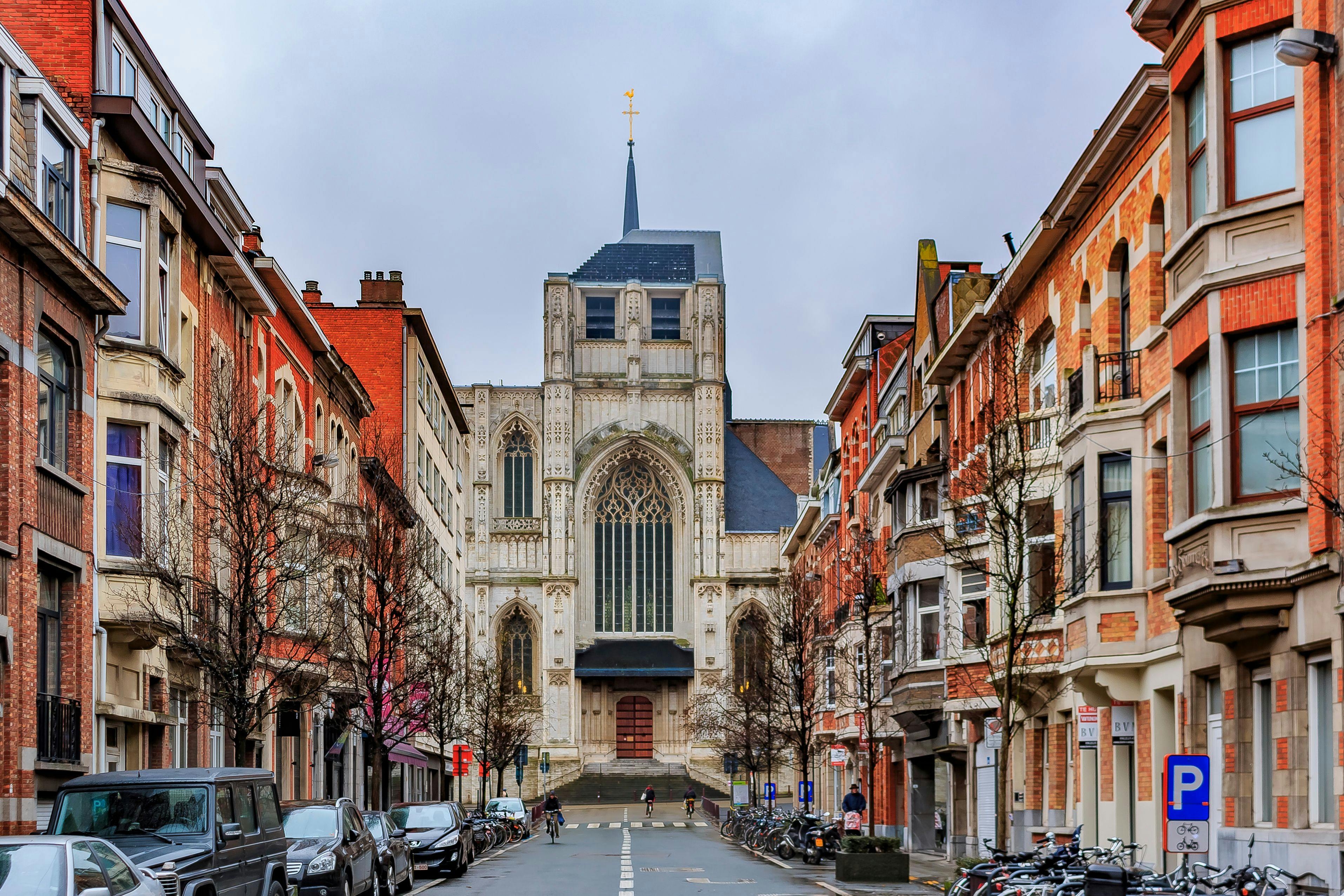 View on medieval St Peter's church and traditional brick houses in Leuven, Belgium | Image Credit: © SvetlanaSF - stock.adobe.com