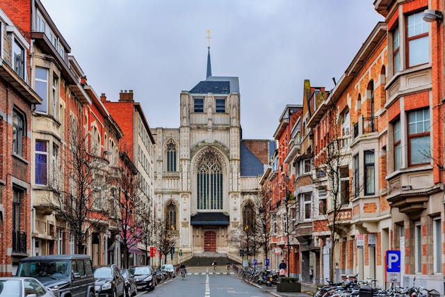 View on medieval St Peter's church and traditional brick houses in Leuven, Belgium | Image Credit: © SvetlanaSF - stock.adobe.com