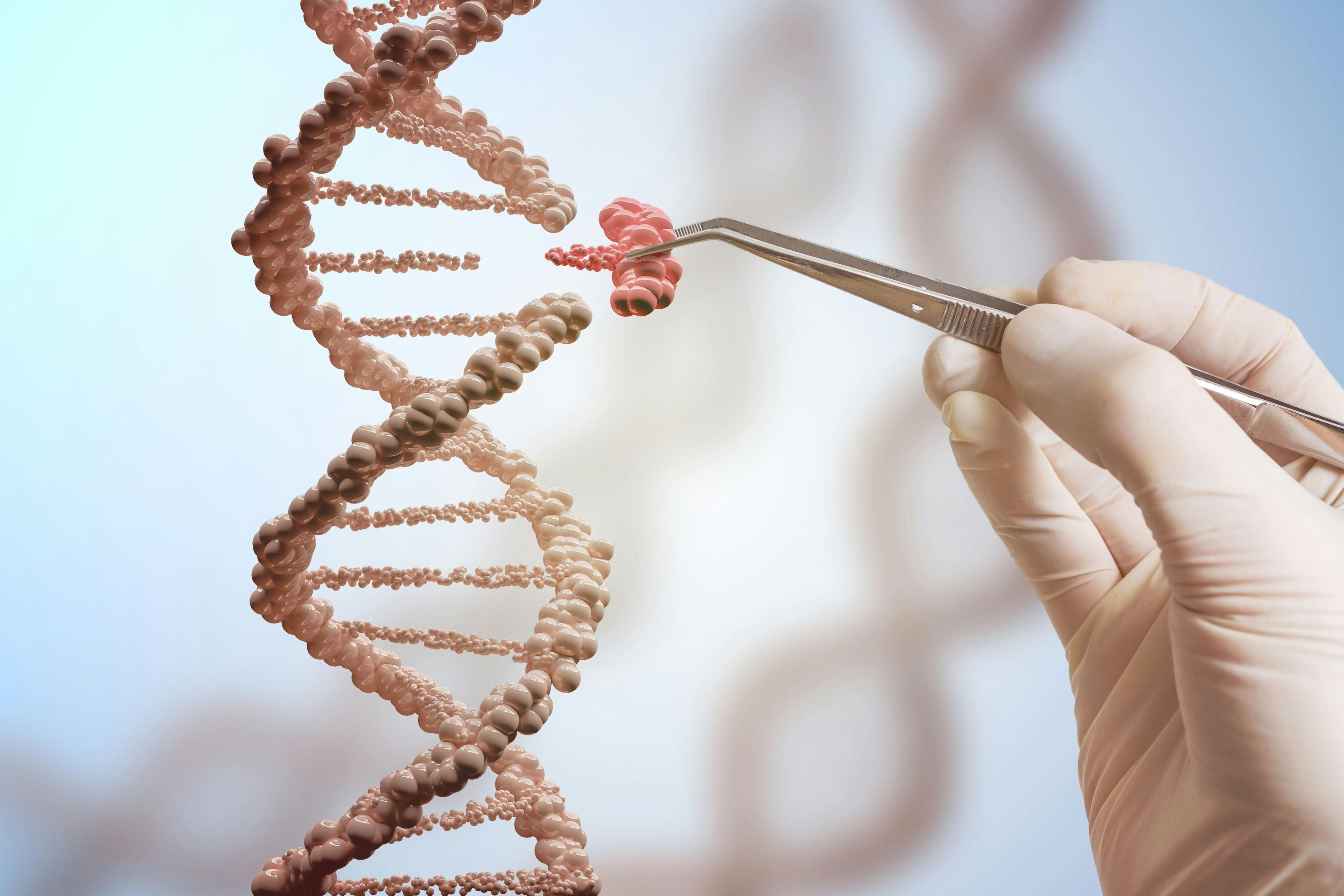 Genetic engineering and gene manipulation concept. Hand is replacing part of a DNA molecule. | Image Credit: © vchalup - stock.adobe.com