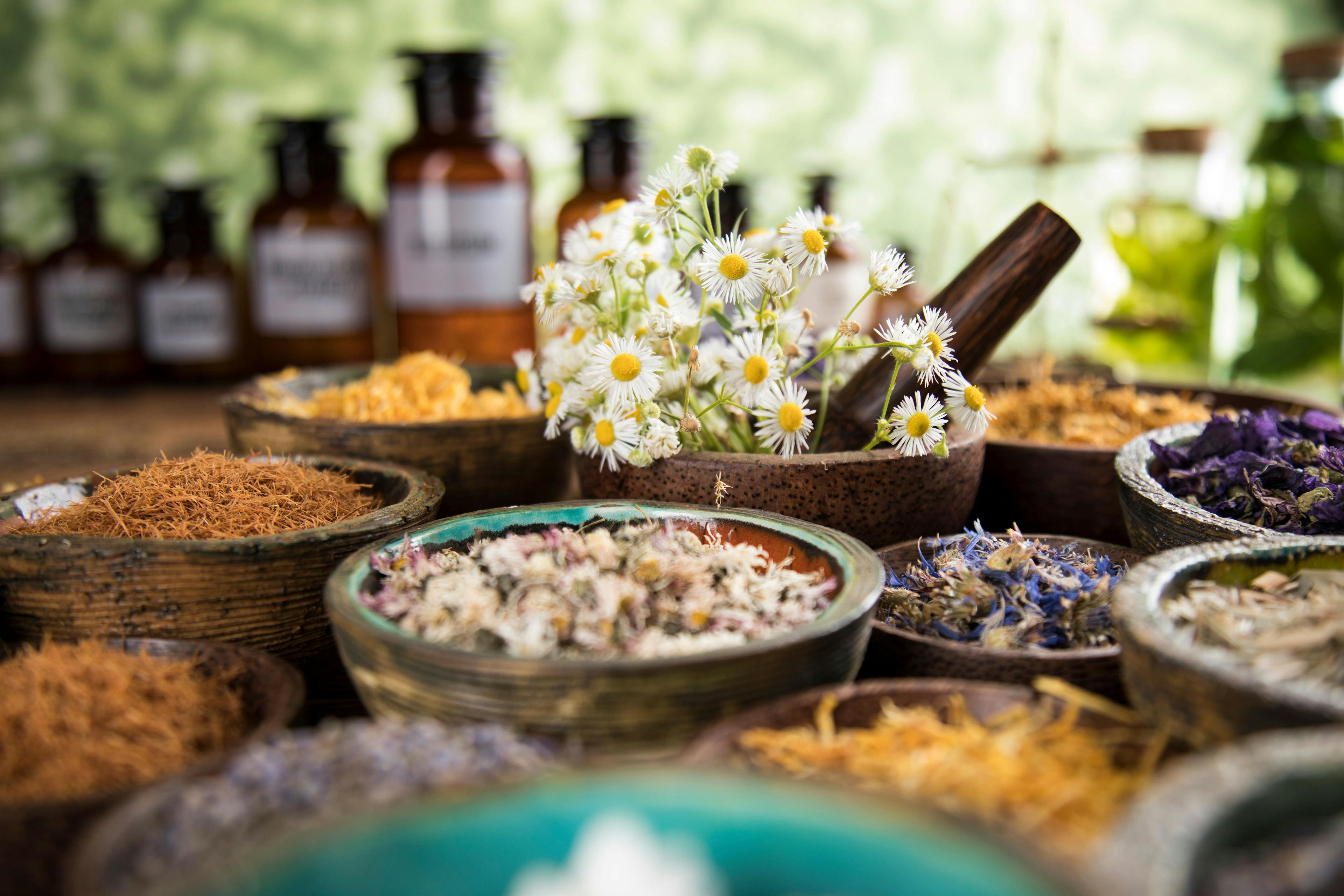 Natural remedy, herbal medicine and wooden table background | Image Credit: © Sebastian Duda - stock.adobe.com