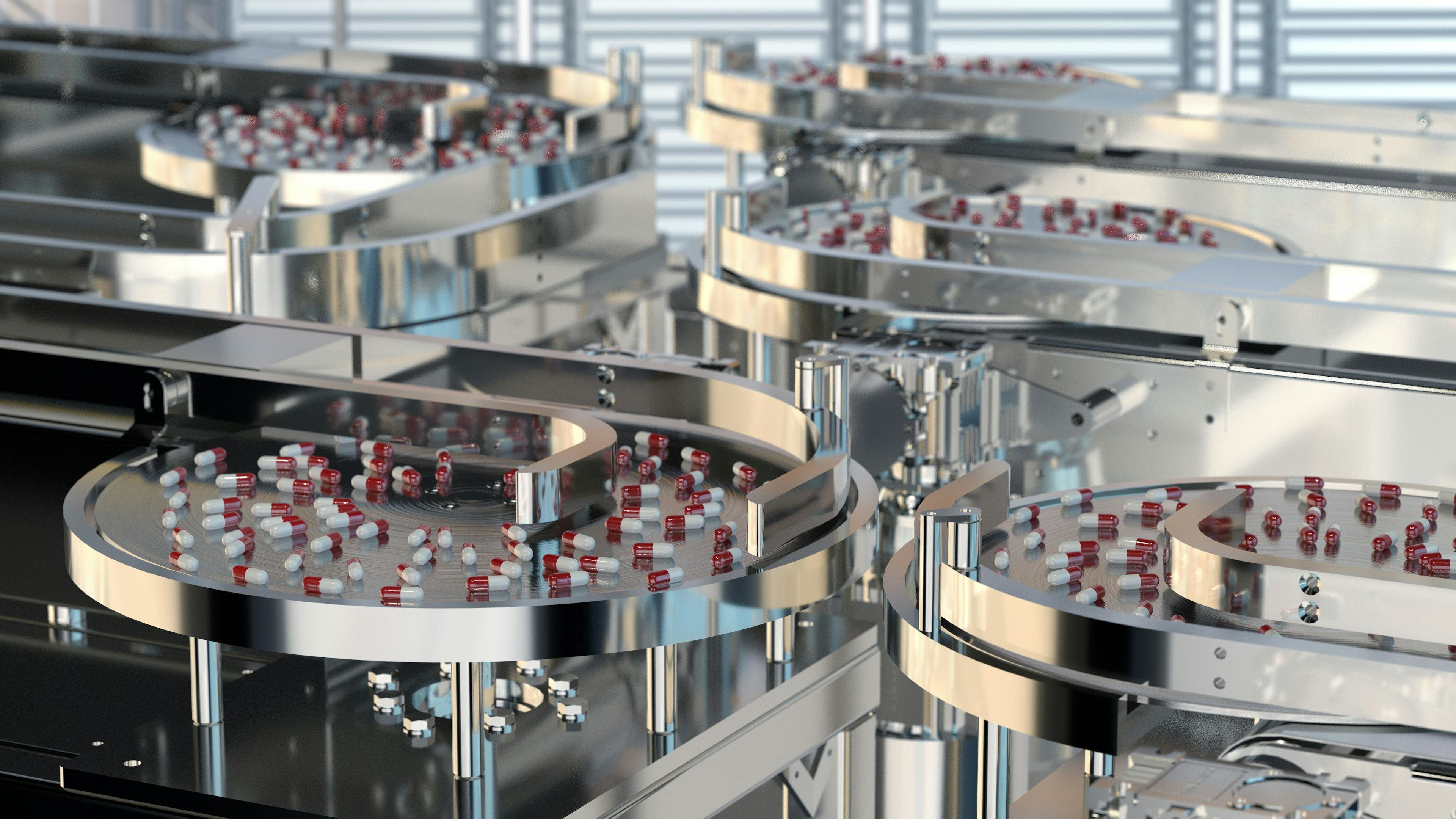 Factory of the pharmaceutical industry. Pills on the conveyor | Image Credit: © Mike Mareen - stock.adobe.com