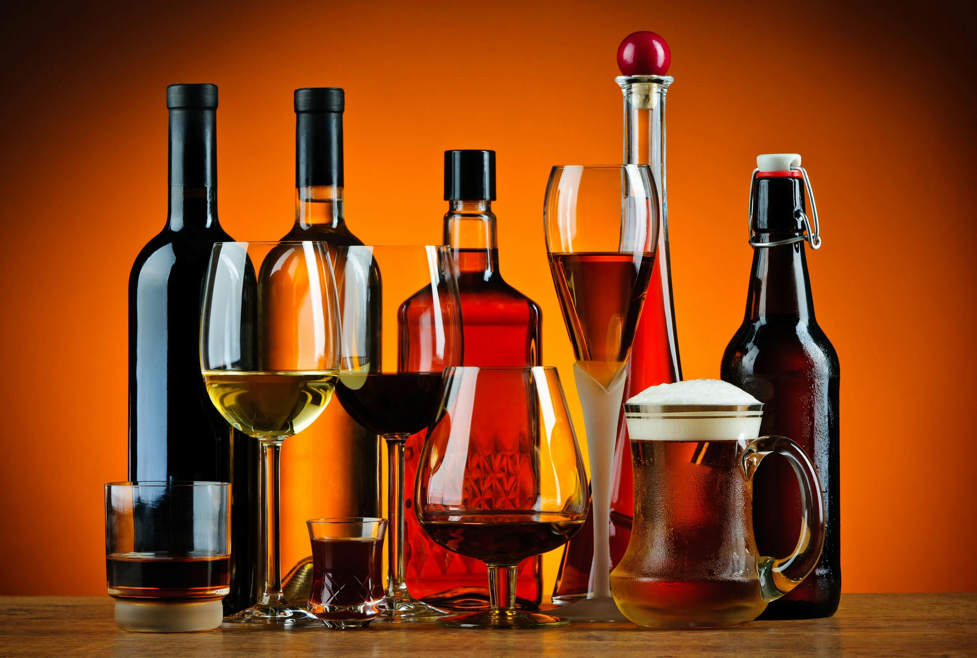 Bottles and glasses of alcohol drinks  | Image Credit: © draghicich - stock.adobe.com