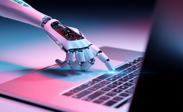 Robotic hand pressing a keyboard on a laptop 3D rendering | Image Credit: © sdecoret - stock.adobe.com