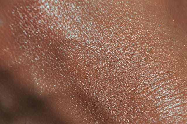 texture of human skin with liquid highlighter swatch | Image Credit: © viki2103stock - stock.adobe.com