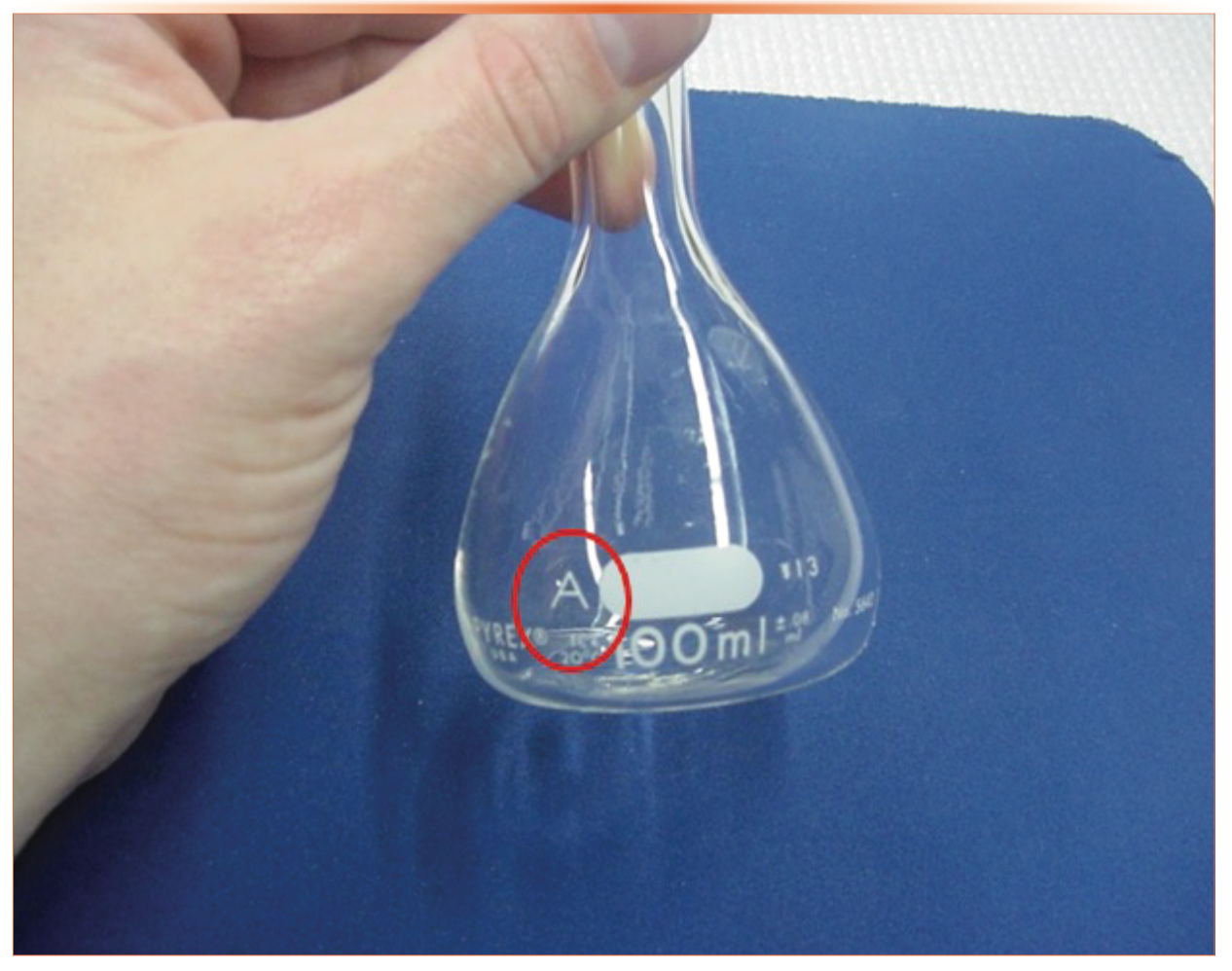 FIGURE 1: Close-up photograph of a 100 mL Class A volumetric flask.