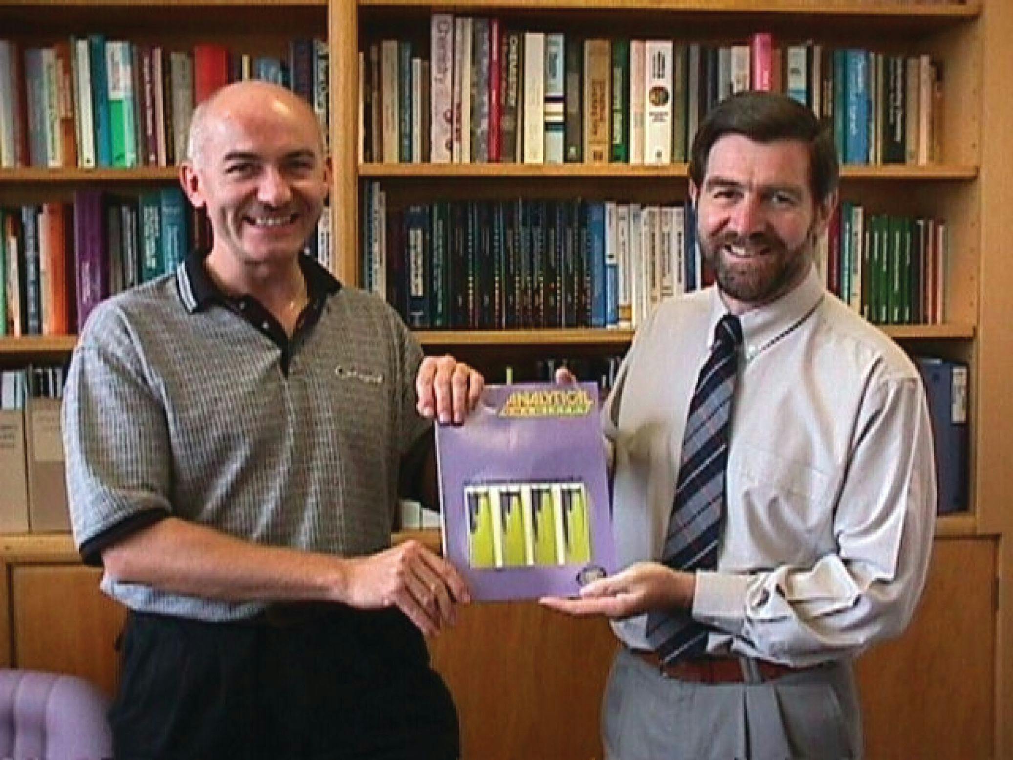 (L to R) Mirek Macka and Paul Haddad celebrating a cover image for an Analytical Chemistry feature article in earlier days, from Anal. Chem. 70(4) 743–749 (1998). Image and citation courtesy of Michael Breadmore, originally from ACROSS.