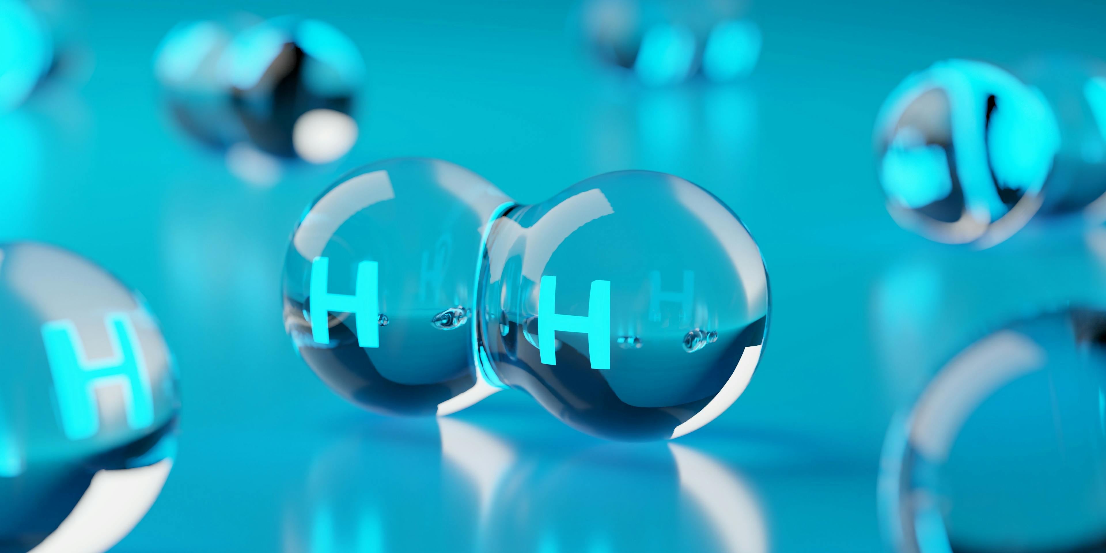 Abstract transparent hydrogen H2 molecules on blue background, clean energy or chemistry concept | Image Credit: © Shawn Hempel - stock.adobe.com