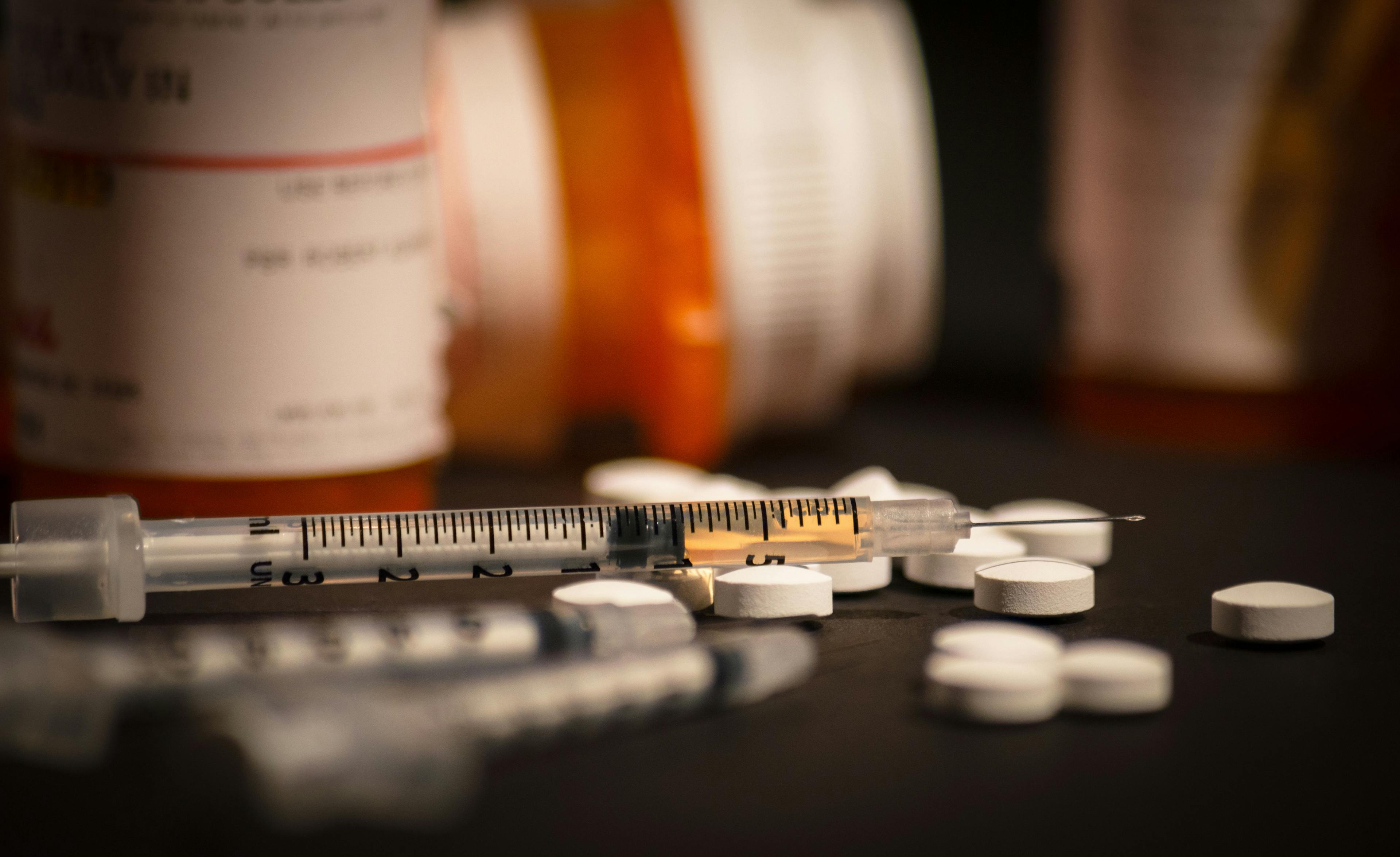 Loaded Syringe and Pills | Image Credit: © Darwin Brandis - stock.adobe.com