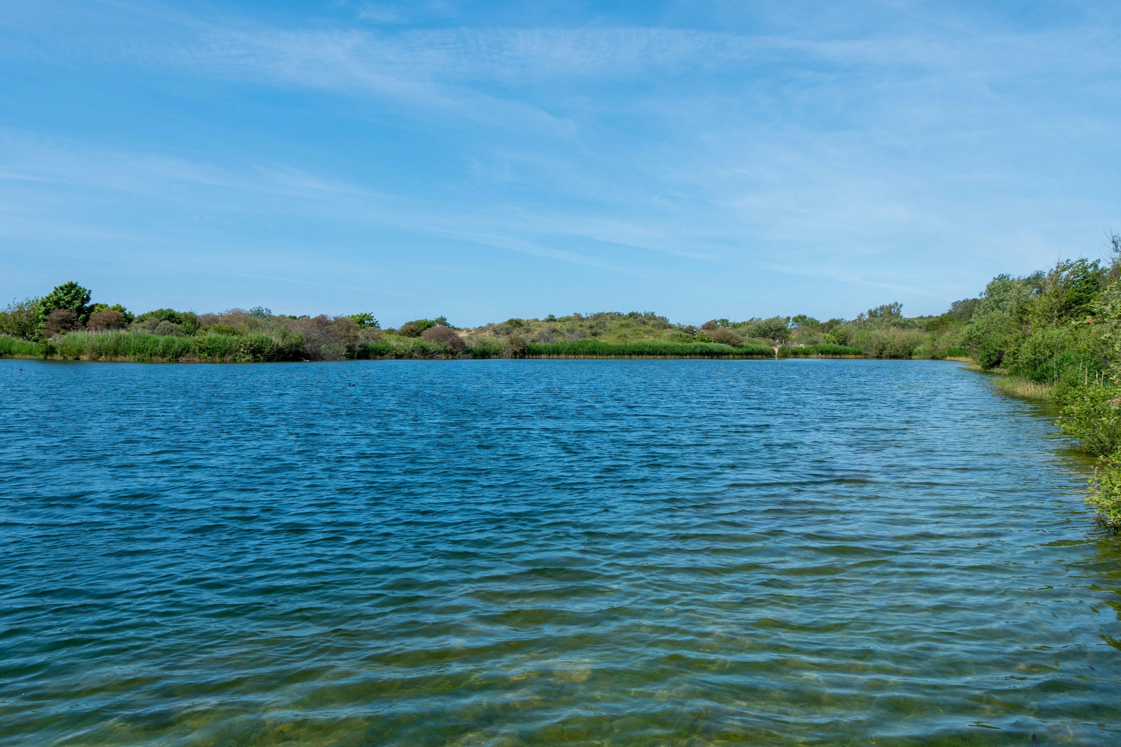 Water reservoir with dunes in the background | Image Credit: © Ferdi - stock.adobe.com.