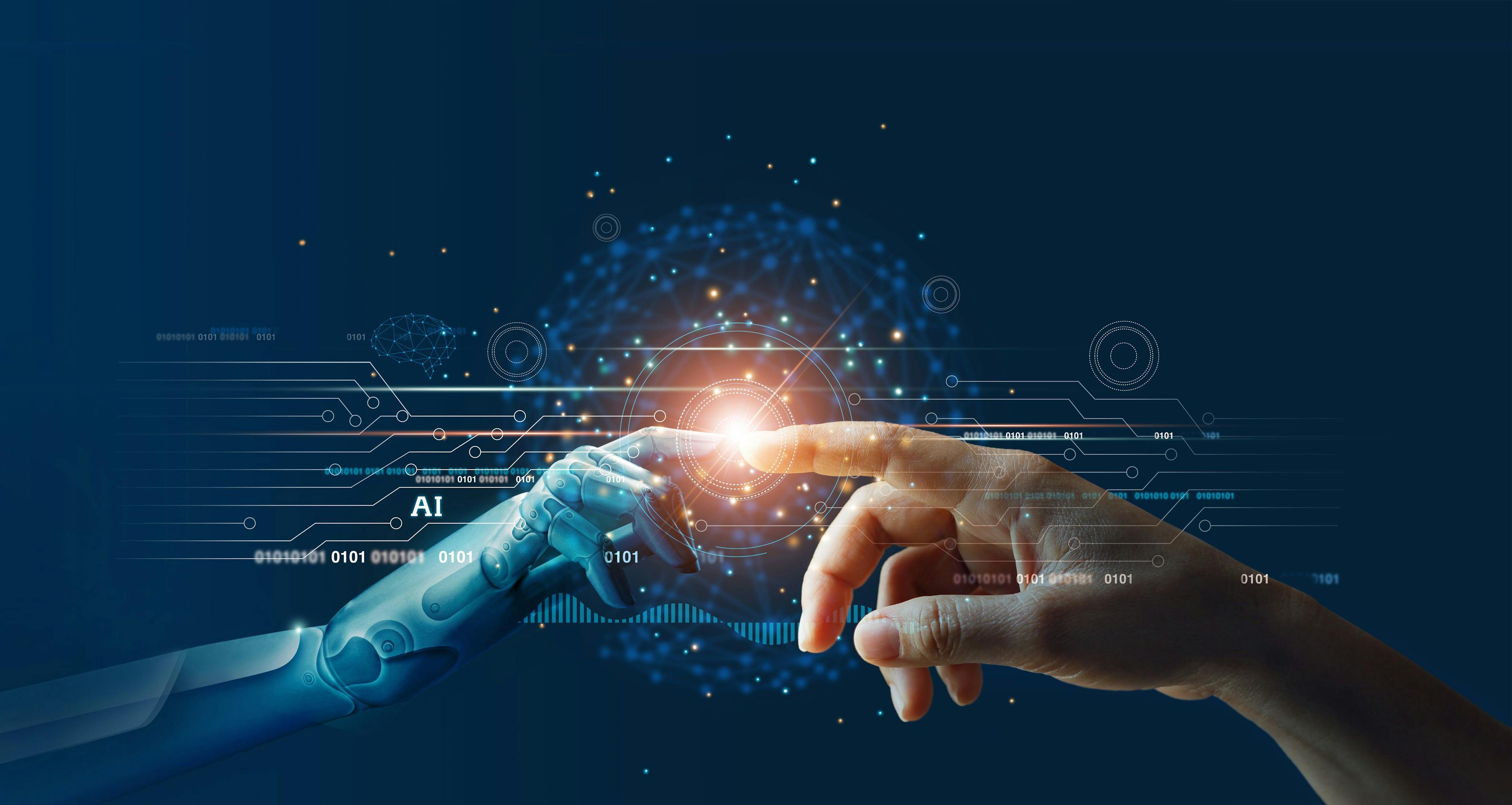 AI, Machine learning, Hands of robot and human touching on big data network connection background, Science and artificial intelligence technology, innovation and futuristic | Image Credit: © ipopba - stock.adobe.com 